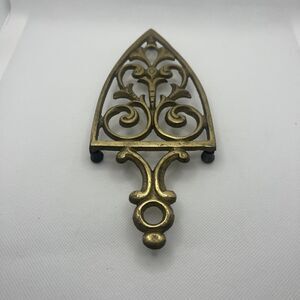 OLD CAST BRASS  FOOTED SAD IRON TRIVETS Antiques Counter Wall Display